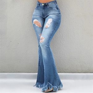 Light wash distressed bell bottom jeans